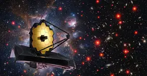 O Telescópio Espacial James Webb detectou manchas vermelhas estranhas no universo primitivo, e agora um estudo sugere que elas não eram galáxias, mas buracos negros jovens crescendo em ritmo acelerado