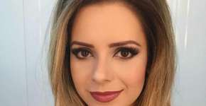 Sandy grita ao ter cabelo puxado por fã em aeroporto