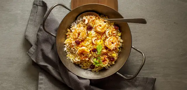 Arroz de frutos do mar: uma viagem à Espanha em cada garfada