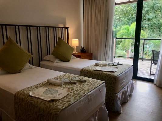 Quartos e chalés do spa e clínica Rituaali