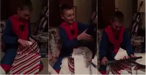 Pai presenteia filho com certificado de adoção e grava reação