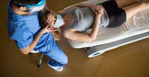 Dor nas costas é sintoma de covid-19? Entenda a relação