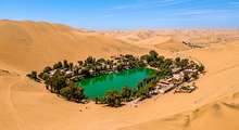 Featured side: Huacachina, o oásis mais famoso da América do Sul: dunas gigantes, uma lagoa esmeralda e a lenda da sereia.