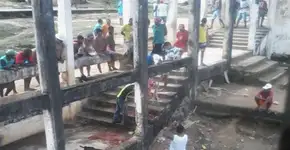 Presos preparam churrasco de gato