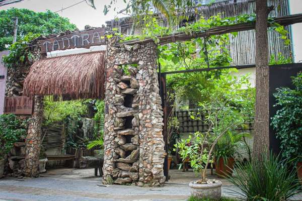 Até a entrada da casa parece te transportar para outra realidade