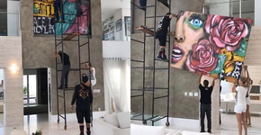 Ana Hickmann coloca andaime em sua sala para instalar quadros