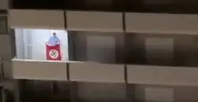 Homem exibe bandeira nazista da sacada de apartamento em Florianópolis